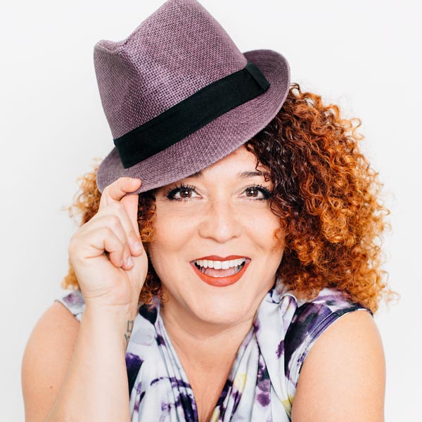 Karen Schleifer portrait with fun hat